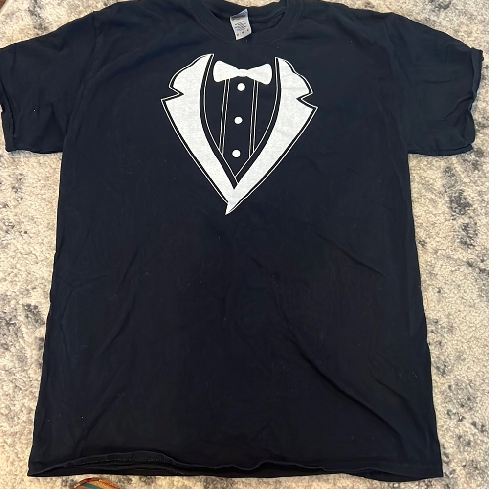 “Tuxedo” shirt. Mens medium. 100% cotton. Color is black with white decoration.